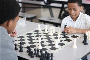 Students playing chess
